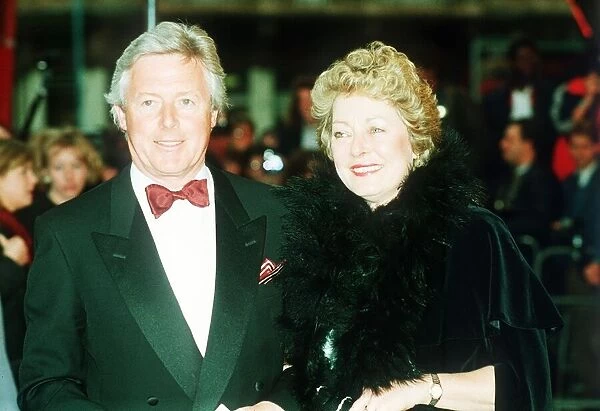 Michael Aspel TV Presenter with wife at the premiere of Where Angels Fear To Tread
