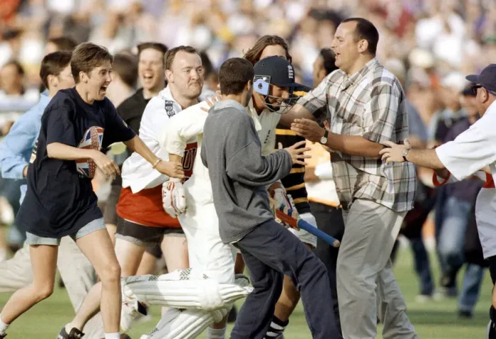 Framed Print : Michael Atherton English captain mobbed after England beat Australia by nine wickets Framed Print : Michael Atherton English captain mobbed after England beat Australia by nine wickets