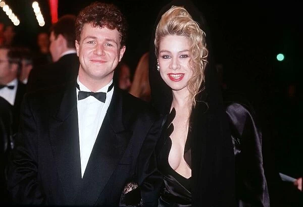 Michael Ball actor and singer with unknown woman at the Premiere of the film Scandal