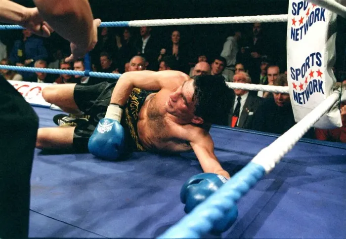 Framed Print : Michael Brodie versus Wilson Docherty November 1997 Wilson Docherty lies on canvas