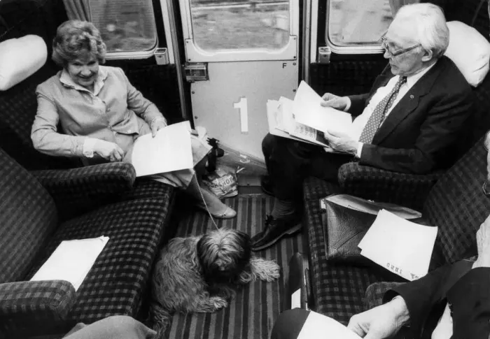 Framed Print : Michael Foot and wife Jill Craigie on train with their dog - May 1983 Framed Print : Michael Foot and wife Jill Craigie on train with their dog - May 1983