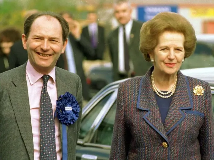 Framed Print : Michael Forsyth MP wearing blue rosette pink shirt patterned tie with Lady Margaret Framed Print : Michael Forsyth MP wearing blue rosette pink shirt patterned tie with Lady Margaret