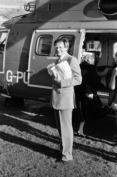 Michael Heseltine about to get into a helicopter. He is pictured a few days following his