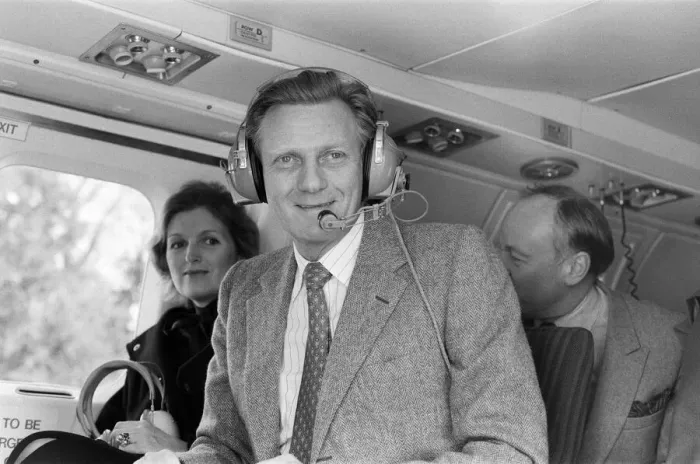 Framed Print : Michael Heseltine in a helicopter. He is pictured a few days following his resignation as