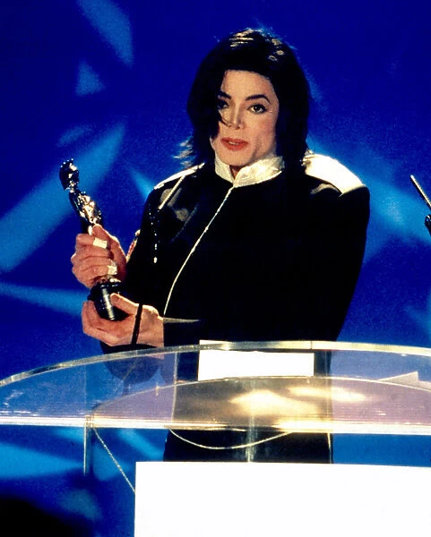 Michael Jackson accepts his award at the 1996 Brit Awards. 20th February 1996