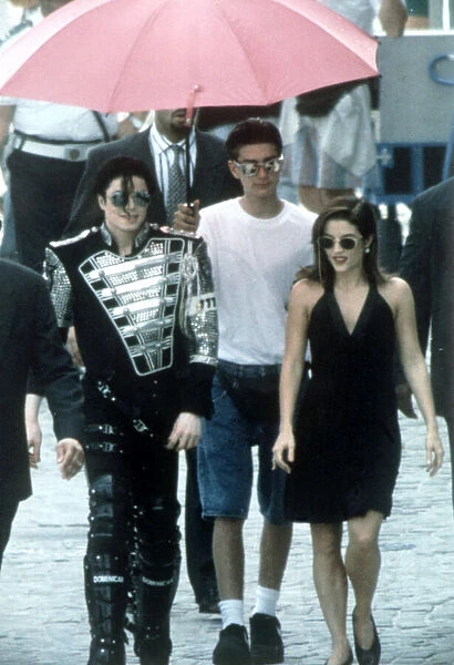 Michael Jackson and his wife Lisa Marie visit two childrenIs hospitals in Budapest