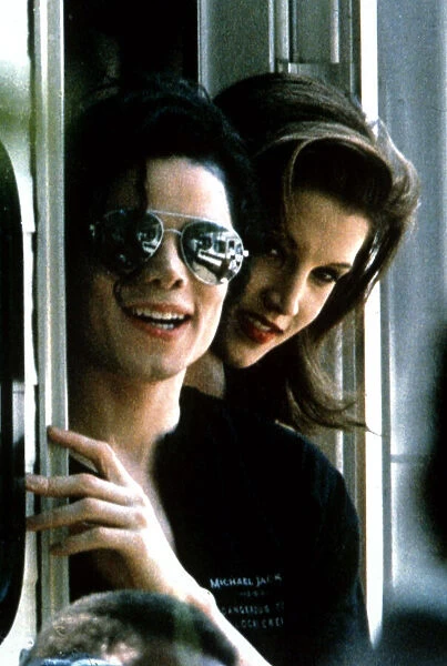 Michael Jackson and his wife Lisa Marie visit two childrenOs hospitals in Budapest