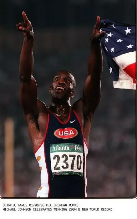 : Michael Johnson celebrates his win in the 200 metres and the new World record : Michael Johnson celebrates his win in the 200 metres and the new World record