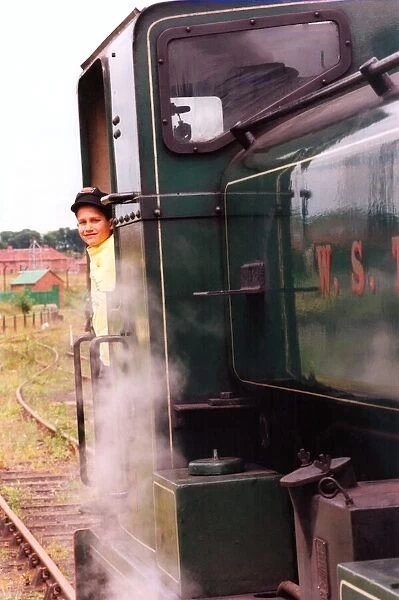 Michael Nelson, 9, from Sunningdale School, sunderland on a steam locomotive at Bowers