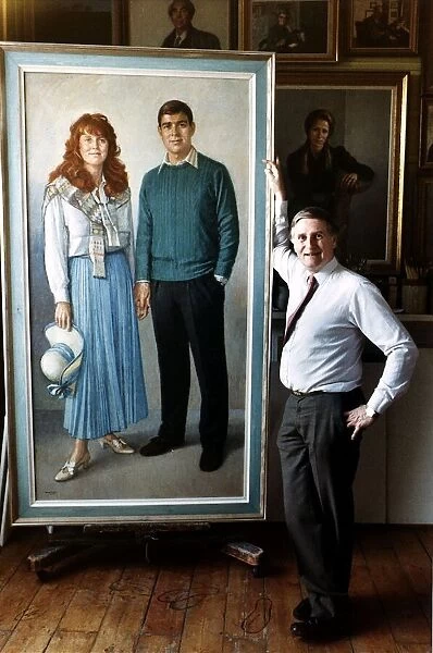 Michael Noakes Royal portrait painter standing in front of his portrait of