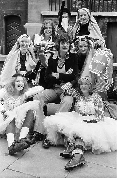 Michael Palin of the Monty Python team with girls from Sidcup during the charity Twits