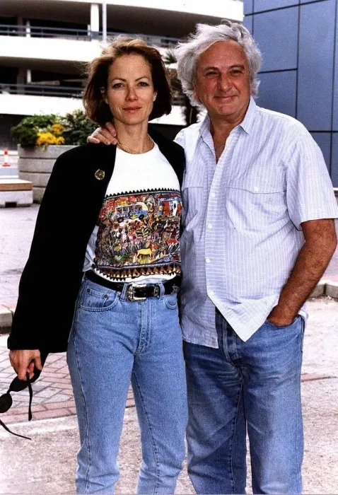 Framed Print : Michael Winner Film Director with actress girlfriend Jenny Seagrove at Heathrow airport