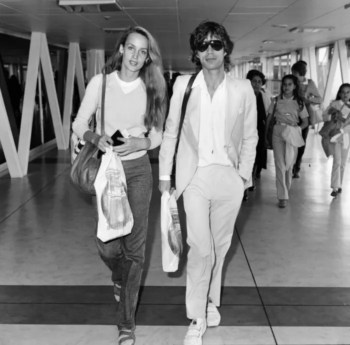 Framed Print : Mick Jagger and girlfriend, model, Jerry Hall, pictured at London Heathrow Airport Framed Print : Mick Jagger and girlfriend, model, Jerry Hall, pictured at London Heathrow Airport