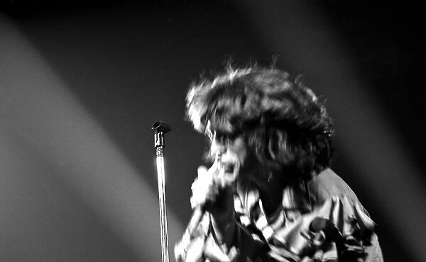 Mick Jagger performing on stage during a Rolling Stones concert at at New Bingley Hall