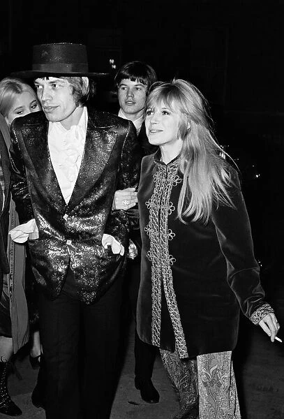 Mick Jagger of The Rolling Stones and Marianne Faithful arriving at The Royal Opera House