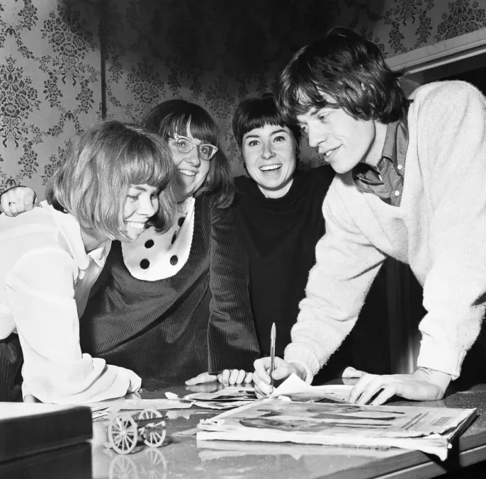 Framed Print : Mick Jagger of the Rolling Stones seen here with three vacationing dutch fans Tonny Framed Print : Mick Jagger of the Rolling Stones seen here with three vacationing dutch fans Tonny