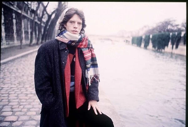 Mick Jagger Singer in Paris wearing a tartan scarf 1985