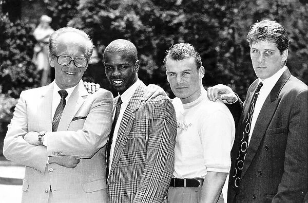 Mickey Duff Boxing Manager and Promoter stands alongside his boxers Duke McKenzie Andy