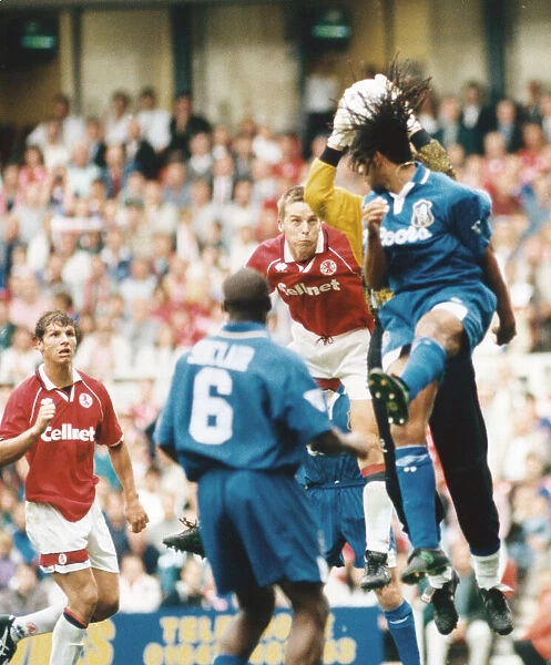 Middlesbrough Jan Fjortoft in an ariel battle in the Chelsea goal mouth