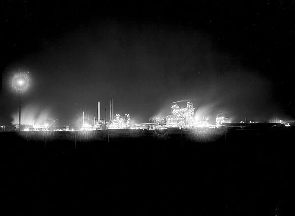 Middlesbrough, petrochemical plant illuminated at night. 14th January 1953