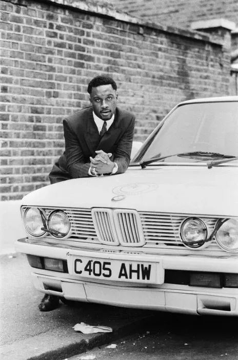 Framed Print : Middleweight boxer Nigel Benn posing with his 3 series BMW. Circa 1987 Framed Print : Middleweight boxer Nigel Benn posing with his 3 series BMW. Circa 1987