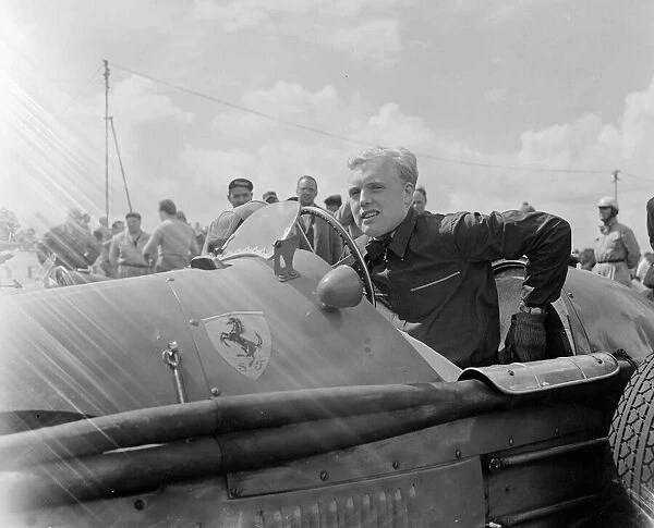 Mike Hawthorn in his Ferrari 500 racing car at Silverstone July 1953