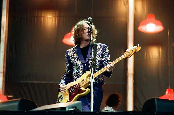 Mike Mills. R. E. M. in concert at the Galpharm Stadium. 25th July 1995