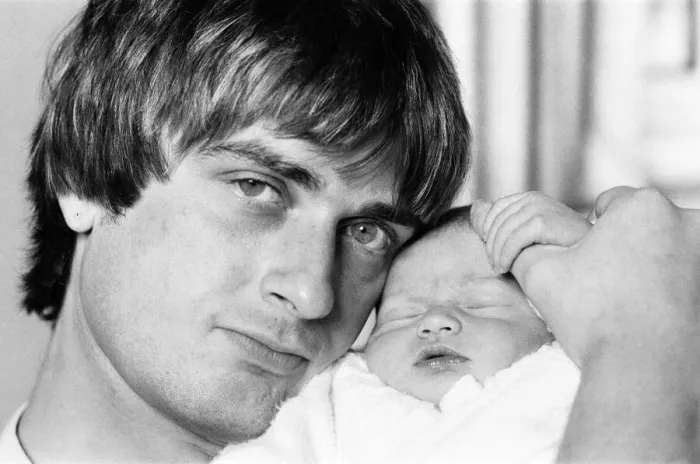 Framed Print : Mike Oldfield, musician and composer, pictured at home with family, baby son Dougal