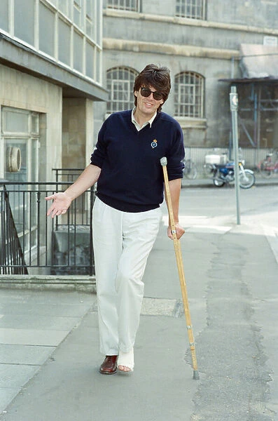 Mike Read, BBC Radio Disc Jockey, seen here on crutches