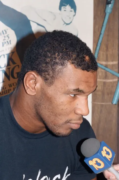 Framed Print : Mike Tyson takes a break from training ahead of his bout with James Bonecrusher Smith Framed Print : Mike Tyson takes a break from training ahead of his bout with James Bonecrusher Smith