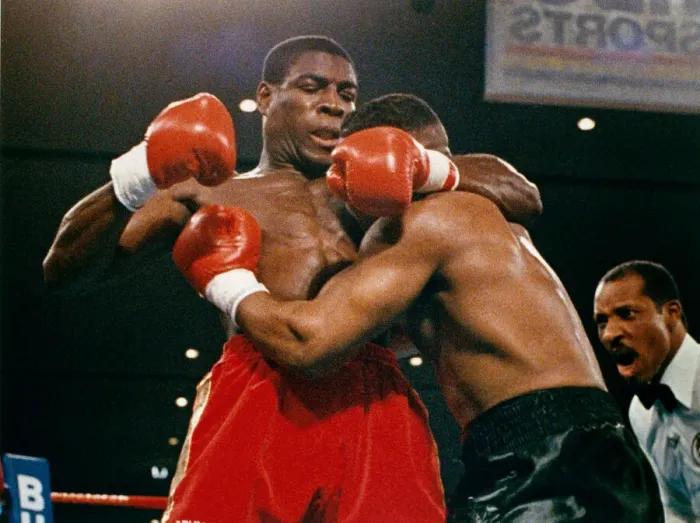 Framed Print : Mike Tyson vs. Frank Bruno for the WBA, WBC, IBF and lineal heavyweight championships