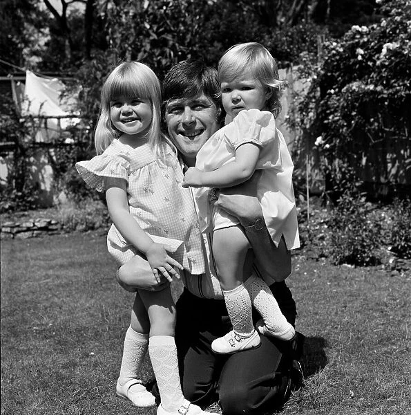 Mike Yarwood with his daughters Charlotte and Claire. 8th July 1974