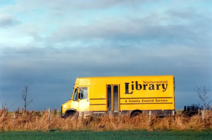 Framed Print : Mike Yorke, Senior Library Assistant on his round with the mobile library in rural Framed Print : Mike Yorke, Senior Library Assistant on his round with the mobile library in rural
