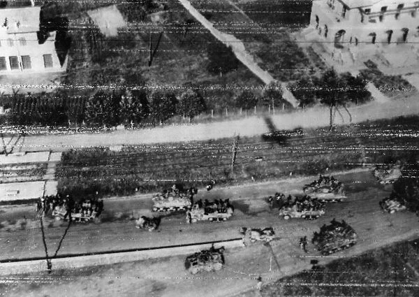 US military vehicles can be seen from this radioed aerial photo gathering in the southern
