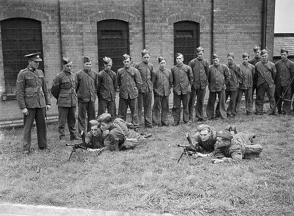 Militiamen under going training with a Bren light machine gun at the South Staffordshire
