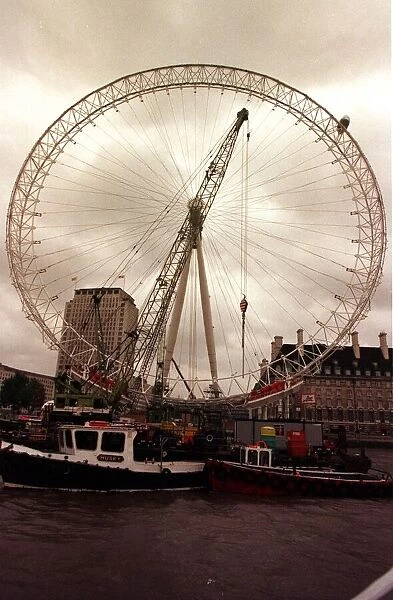 Millennium Wheel London Eye Nov 1999 Workmen check the first capsule to be put