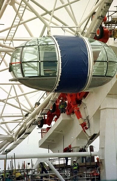 Millennium Wheel London Eye Nov 1999 Workmen check the first capsule to be put