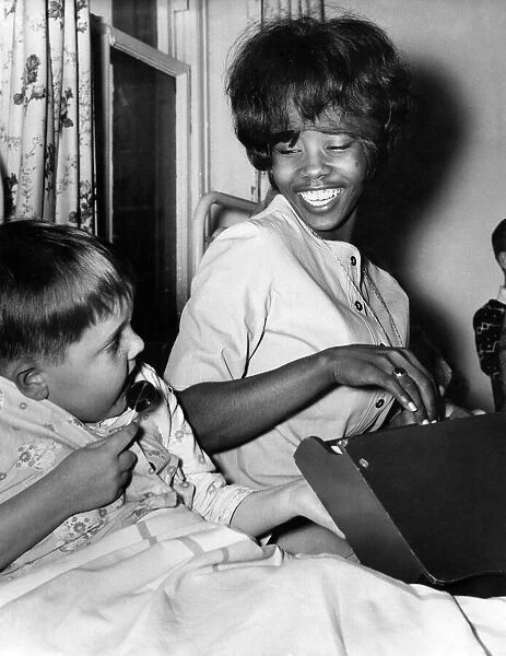 Millie Small sings her hit song My boy lollipop to William Entwhistle (5