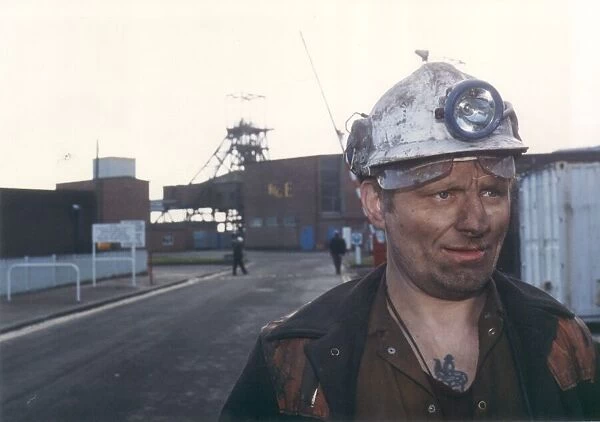 A miner at the entrance to Ellington Colliery with the Big E