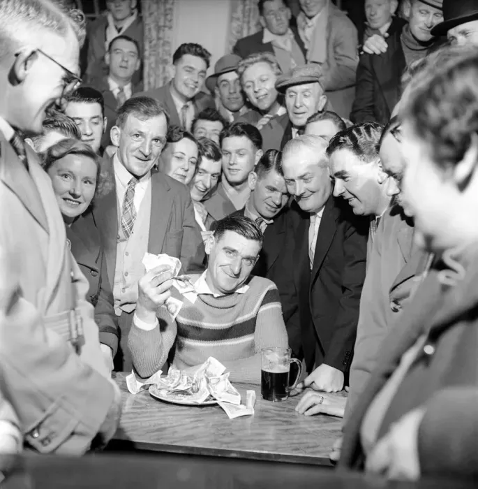 Framed Print : Miner Joe Steele seen here taking part in a food eating competition