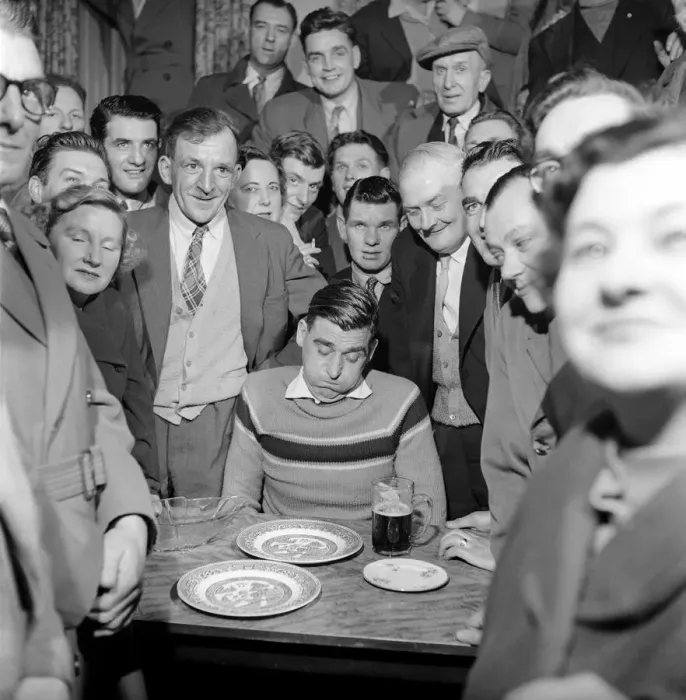 Framed Print : Miner Joe Steele seen here taking part in a food eating competition