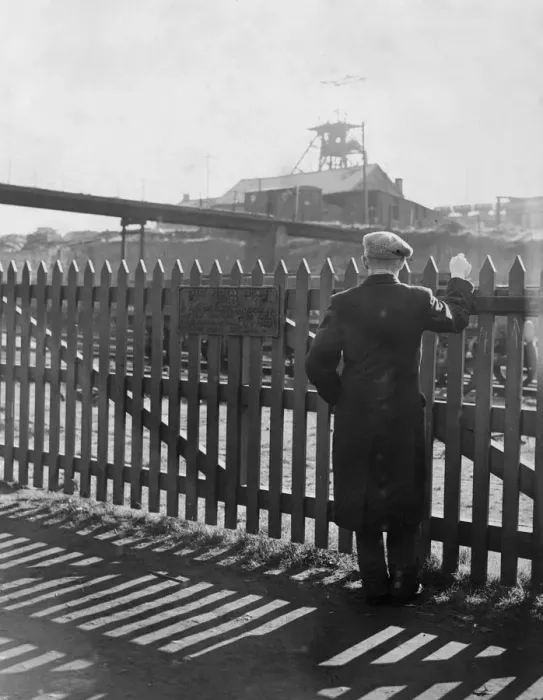 Framed Print : A miner looks over the fence toward the Gorkie Colliery during the miners strike in World