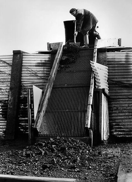 Miner at work in a coal mine. January 1974 P018151