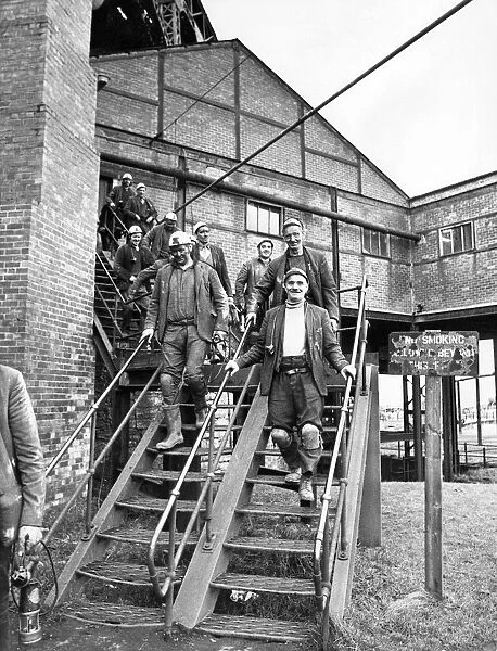 Miners leave danger behind after finishing a shift at Elemore Colliery