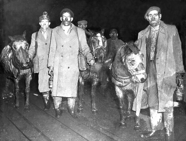 Miners leaving their pit after their shift with the ponies