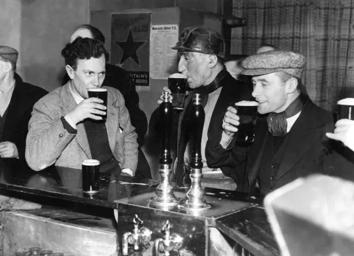 Framed Print : These miners relaxing after a hard day at work in their local working mens club