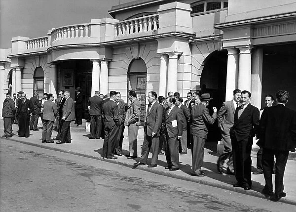 Miners wait outside of the Pavilion at Porthcawl, for the annual NUM South Wales miners