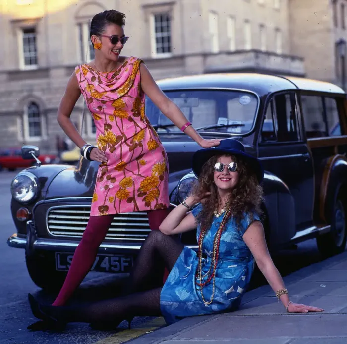 Framed Print : Mini Dress Fashion Two models wear floral print dresses in sixties style August Framed Print : Mini Dress Fashion Two models wear floral print dresses in sixties style August