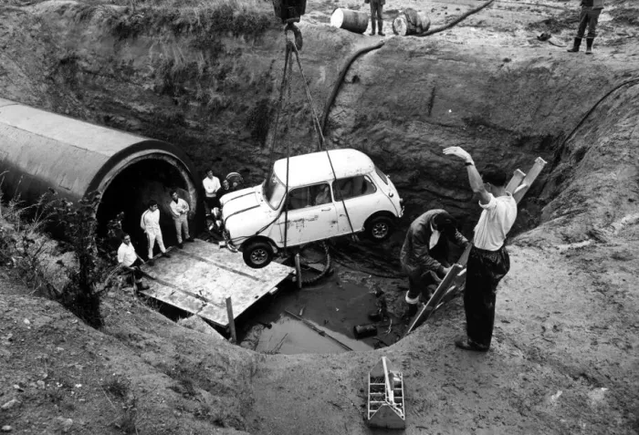 Framed Print : A Mini is lowered into Coventry sewers during the filming of The Italian Job Framed Print : A Mini is lowered into Coventry sewers during the filming of The Italian Job