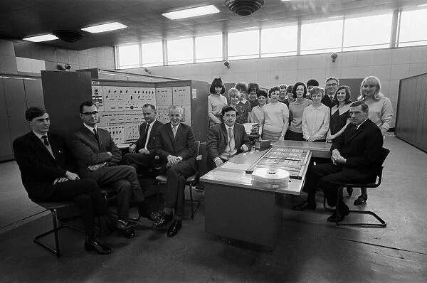 Ministry of Social Security. Pictured, staff and the control section of the computer